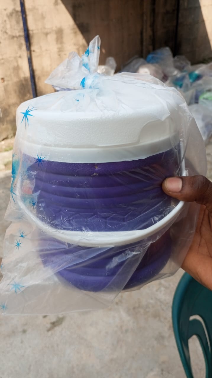 Purple takeaway pack container for takeaway packs section